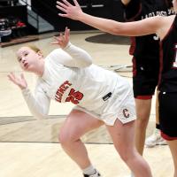 Alice Park reaches up to try and grab the basketball