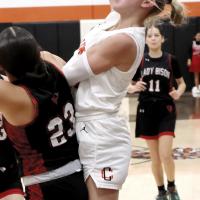 Lila Winegeart puts up a shot in traffic