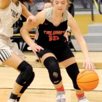 Mattie Pritchett dribbles into the paint