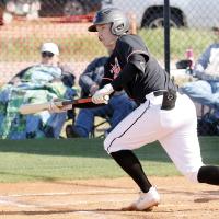 Dalton Belcher drops down a bunt