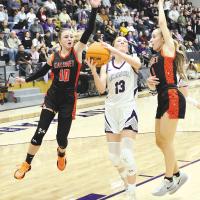 Katie Parham tries to squeeze off a shot