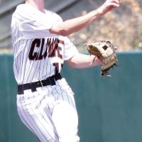 Kyler Thiessen leaps into the air to make a throw