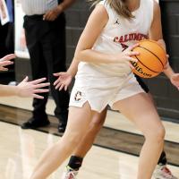 Brenlee Voss looks to make a pass after grabbing a loose ball