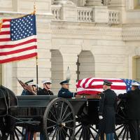 The casket of 39th U.S. President Jimmy Carter arrives at the Capitol Building