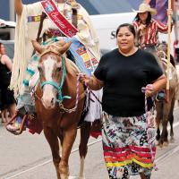 Cheyenne Tribal Princess Cayden Mae Little Coyote rides horseback