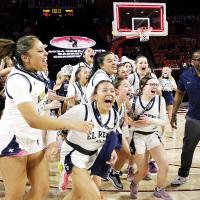 El Reno High School players react to their names being called as the Class 5A state champions