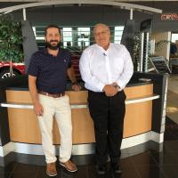 Cole Dorsey, left, and Rick Jones inside the dealership