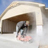 Ramon Ruiz peers through a cloud of dust 