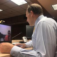 District Judge Paul Hesse conducts a hearing
