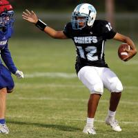 Darlington football_Revels dodges tackler