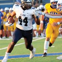 Darius Moore eludes a Piedmont tackler