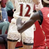 Deazhon Perkins shoots a baseline jumper