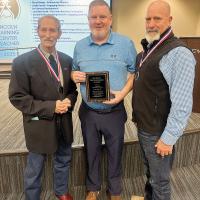 From left, Marty Hall, Ryan Eaton and Dr. Rhys Cole