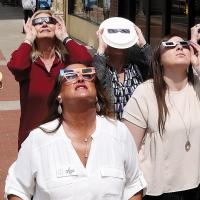 People from downtown businesses used different types of viewing devices