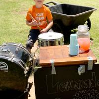 Keegan Miller used his drum skills to draw attention to his lemonade stand
