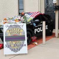 A memorial to El Reno Sgt. Thomas Duran has been set up outside the El Reno Police Department