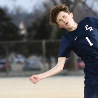EHS boys soccer_Vickers uses his head to redirect pass