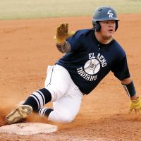 Dacus Cooper slides into third base
