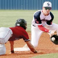 Davin Shamblin scoops up a pickoff throw