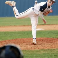 Davin Shamblin watches a pitch sail toward home plate