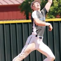 Gavin Tinsley leaps to make an over the shoulder catch behind second base