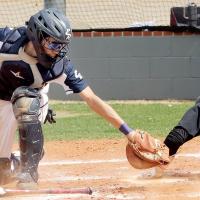 Austin Castanon just misses the elbow of a Chickasha base runner