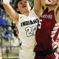 EHS boys basketball_Robertson shoots over defender