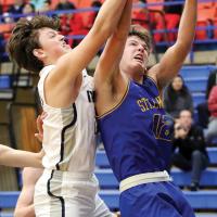 EHS boys basketball_Robertson battles for rebound