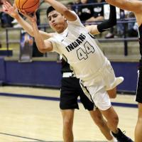 EHS boys basketball_RomanNose tries to hang onto the ball