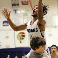 EHS boys basketball_Nicholson tries to put up shot