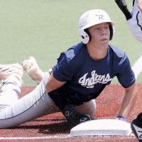 Dawson Davidson looks up for the ball after sliding headfirst into third base