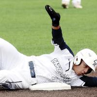 Jovanny Rosas slides wide of the bag to avoid a sweep tag