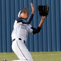 Jovanny Rosas (7) runs under a pop fly 
