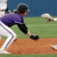 Gabe Compton eyes a pickoff throw