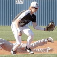 Gavin Tinsley steps in front of a Clinton base runner to snag a throw