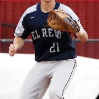 Grady Lesperance eyes a throw to first base