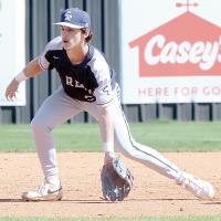 Blake Bailey reaches out his glove as he attempts to snag a pickoff throw