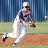 Preston Ashford stretches out to field a grounder