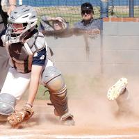 Grady Lesperance scoops up a low throw to the bag