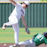 Jonathan Shelley tries to knock down a pickoff throw to second base