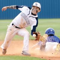 Vincent Walker steps in front of a base runner to snag a pickoff throw
