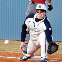 Kyston Haines reaches down to snag a late throw to the bag