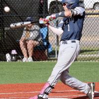 Gabe Compton connects with a pitch