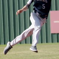 Vincent Walker leaps into the air over second to snag a high pickoff throw
