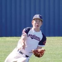 Austin Steffler slides down on his knees to get under the ball to make a catch