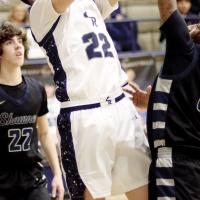 Logan Thunderbull shoots a jumper along the baseline