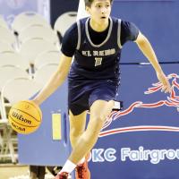 Carter Roman Nose dribbles up the court