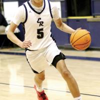 Carter Roman Nose drives into the lane