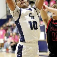 Kaleb Blackwolf shoots a jumper under the basket