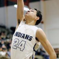 Tre Davis slams home two of his points